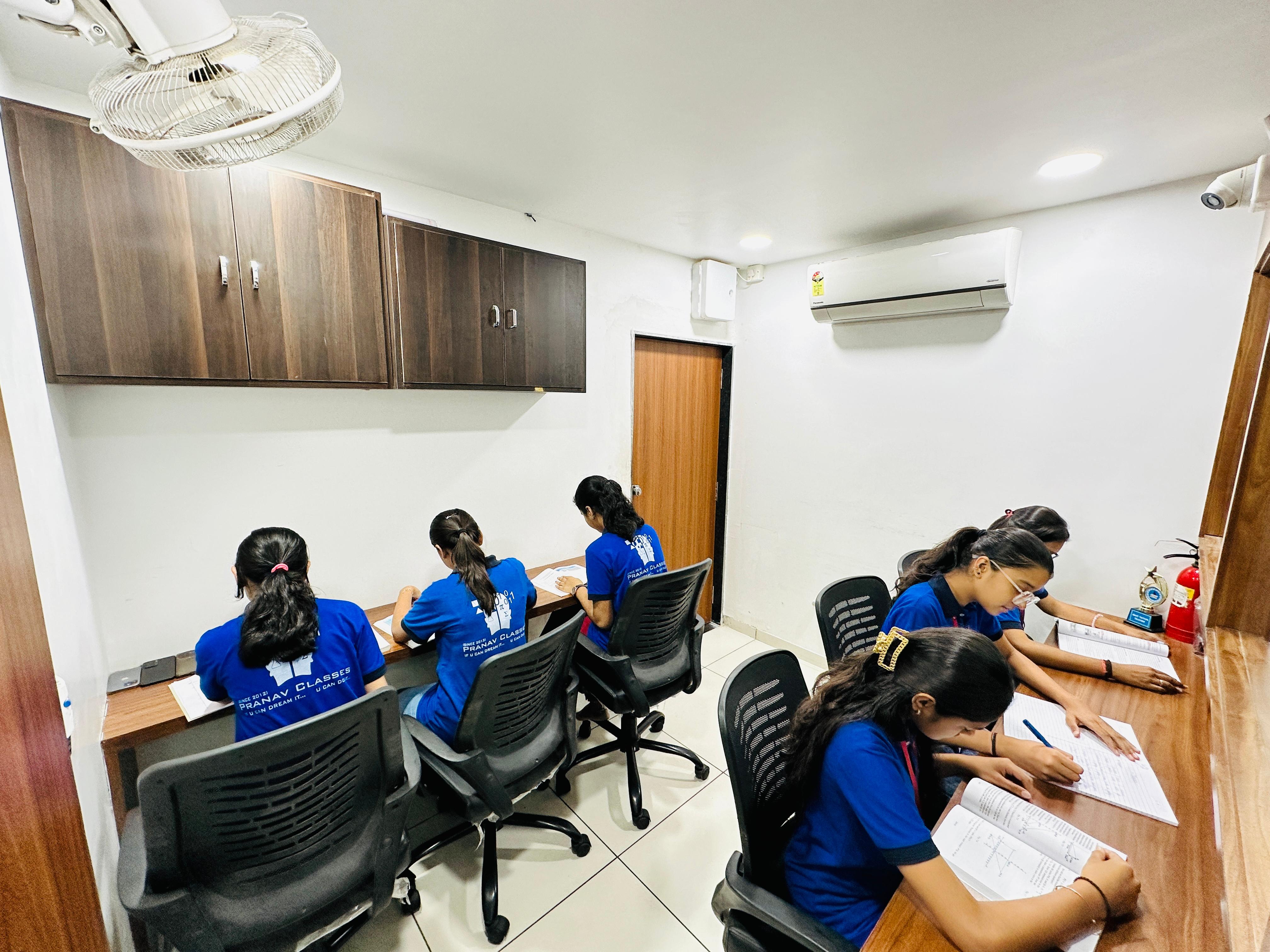 Students studying in library room